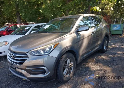 2018 Hyundai Santa Fe Sport 2.4L z USA, uszkodzony, nr VIN 5NMZTDLB8JH082371